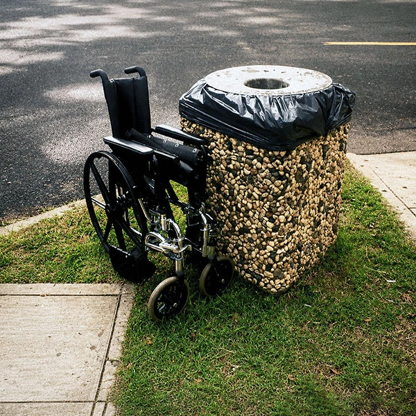 LG Williams, Hallelujah!, 2009, Wheel Chair and Garbage Can.